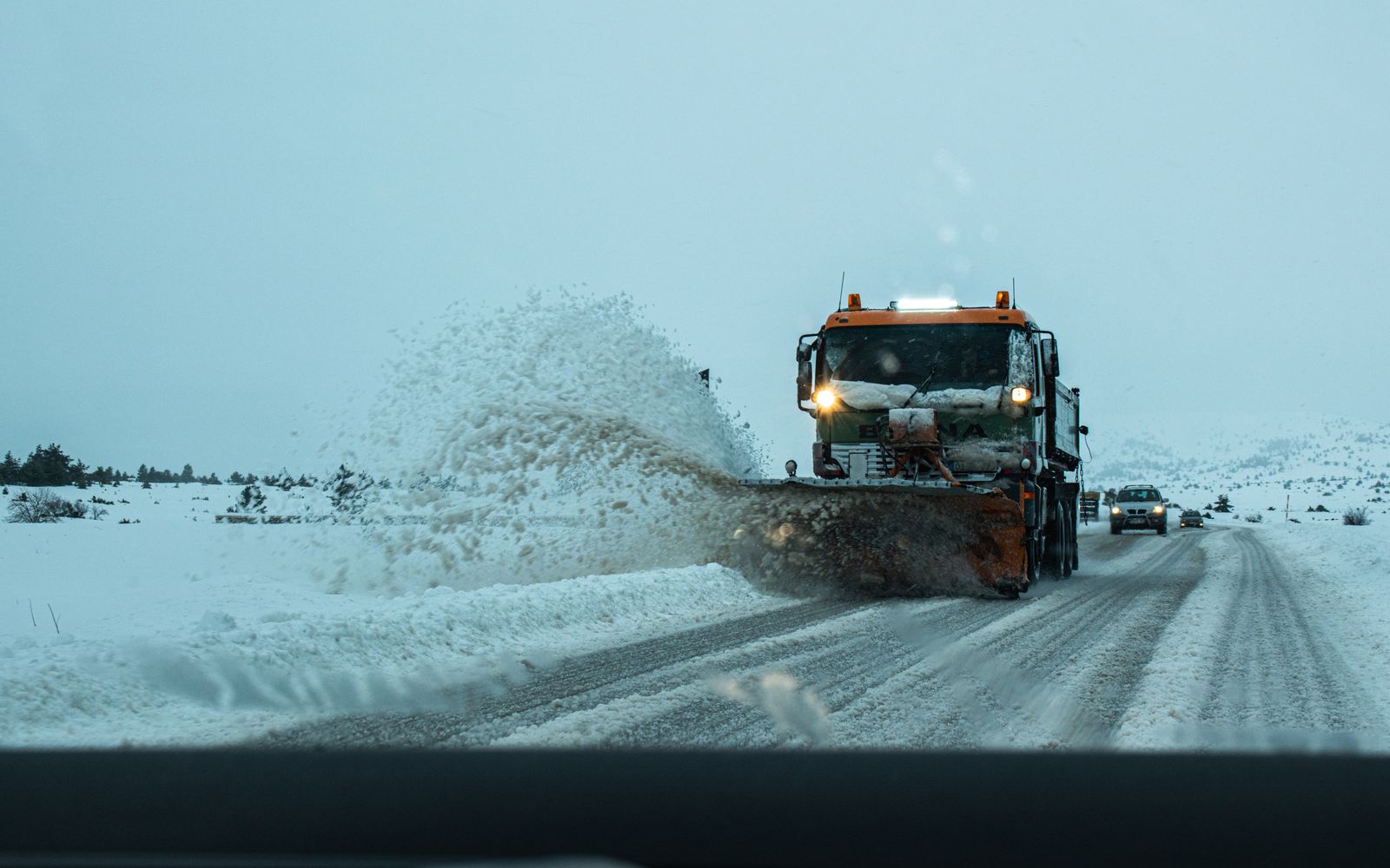 Snow plow keeping a road clear
