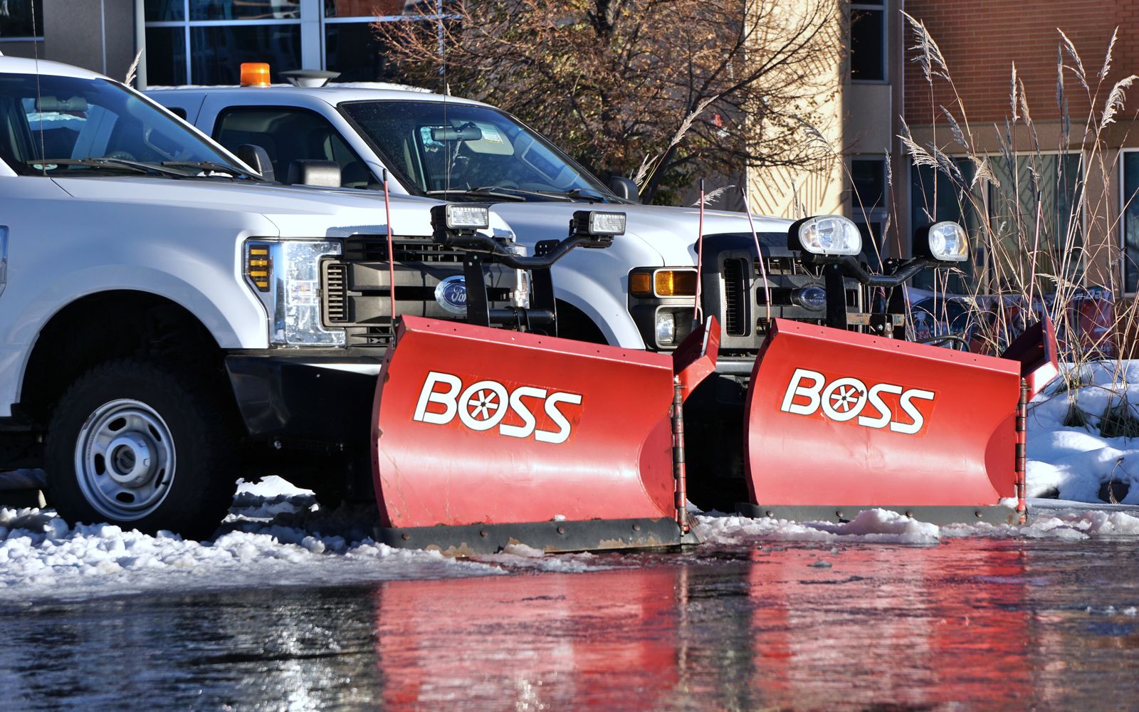 Snow plow trucks prepared for deployment