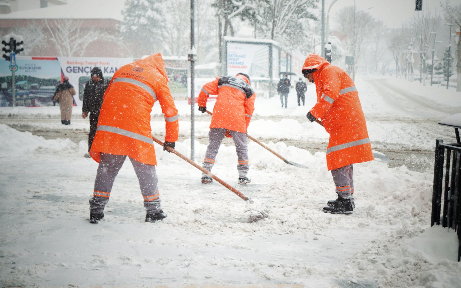 Winter maintenance crew working in snowy conditions